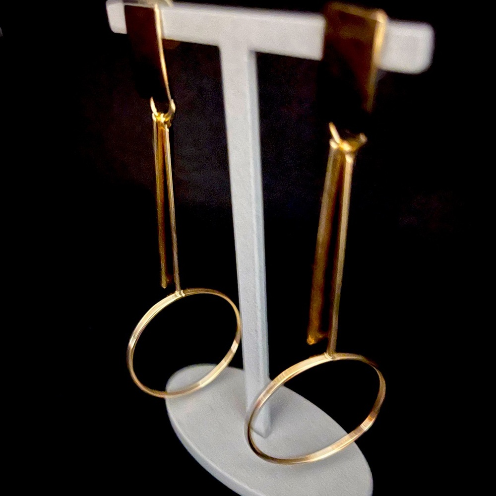 Long dangle modern gold hoops